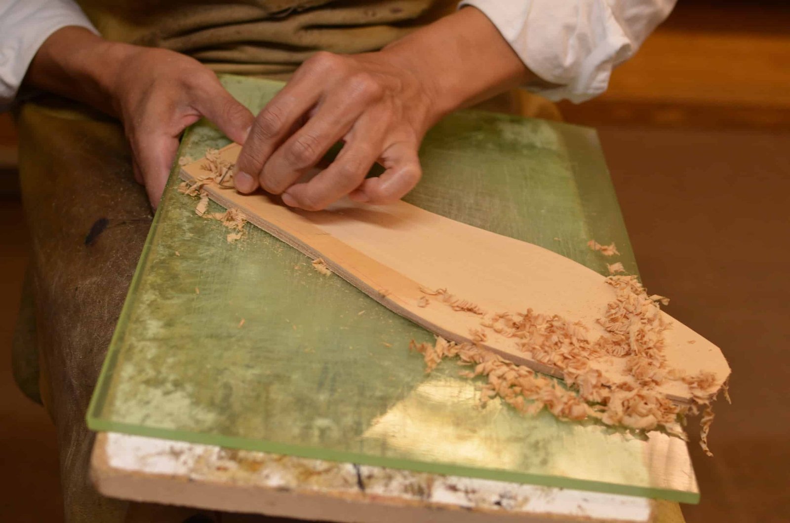 Shaved with a piece of glass.