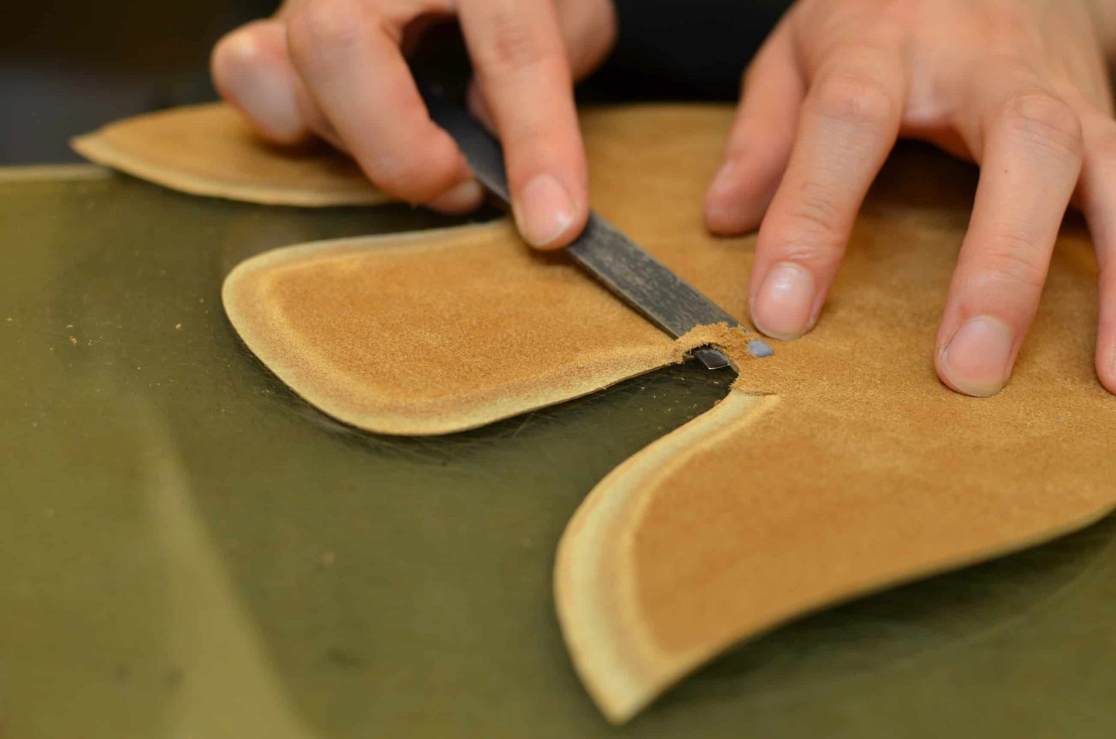 Skiving the edges to get a smooth transition between the pieces.