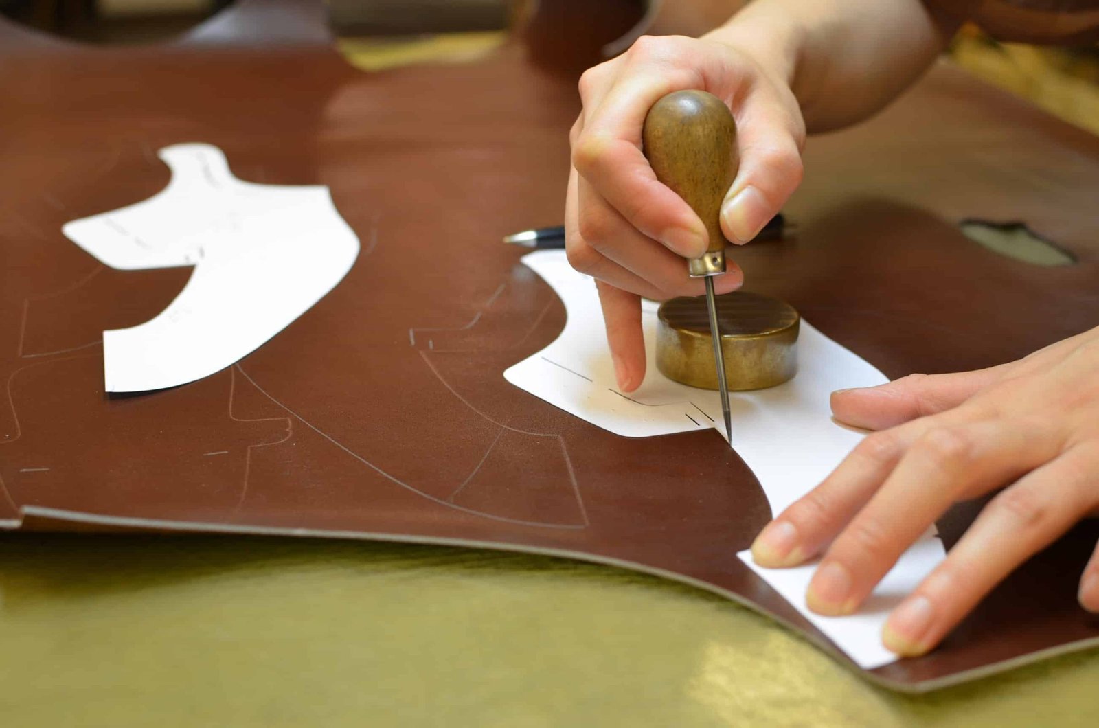 The pattern is transferred to the hide.